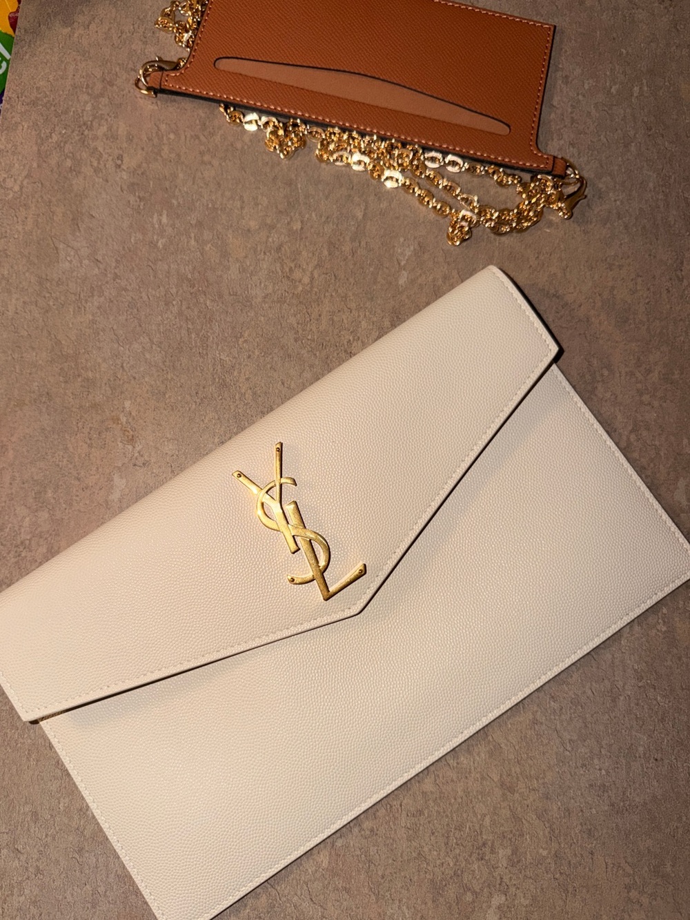 Saint Laurent Cream Envelope Clutch with Gold YSL Logo